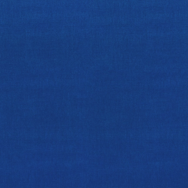 Close-up of deep sapphire-blue fabric with a fine, subtly mottled woven texture