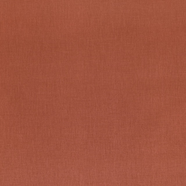 Muted rust terracotta fabric with a fine, even woven texture