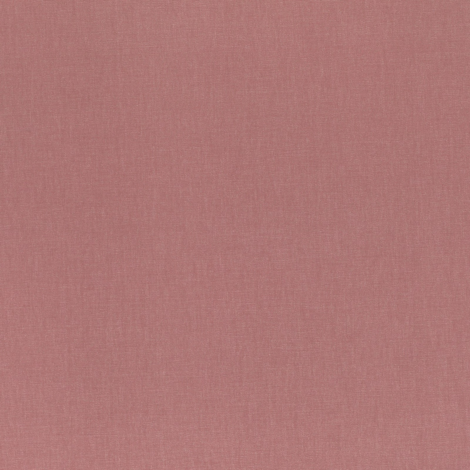 Muted vintage rose pink fabric with a fine, subtly irregular woven surface