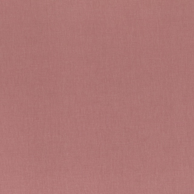 Muted vintage rose pink fabric with a fine, subtly irregular woven surface