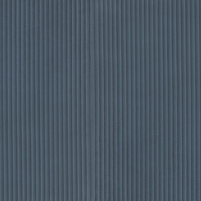 Muted denim-blue upholstery textile with closely spaced vertical ribs and soft tonal shading