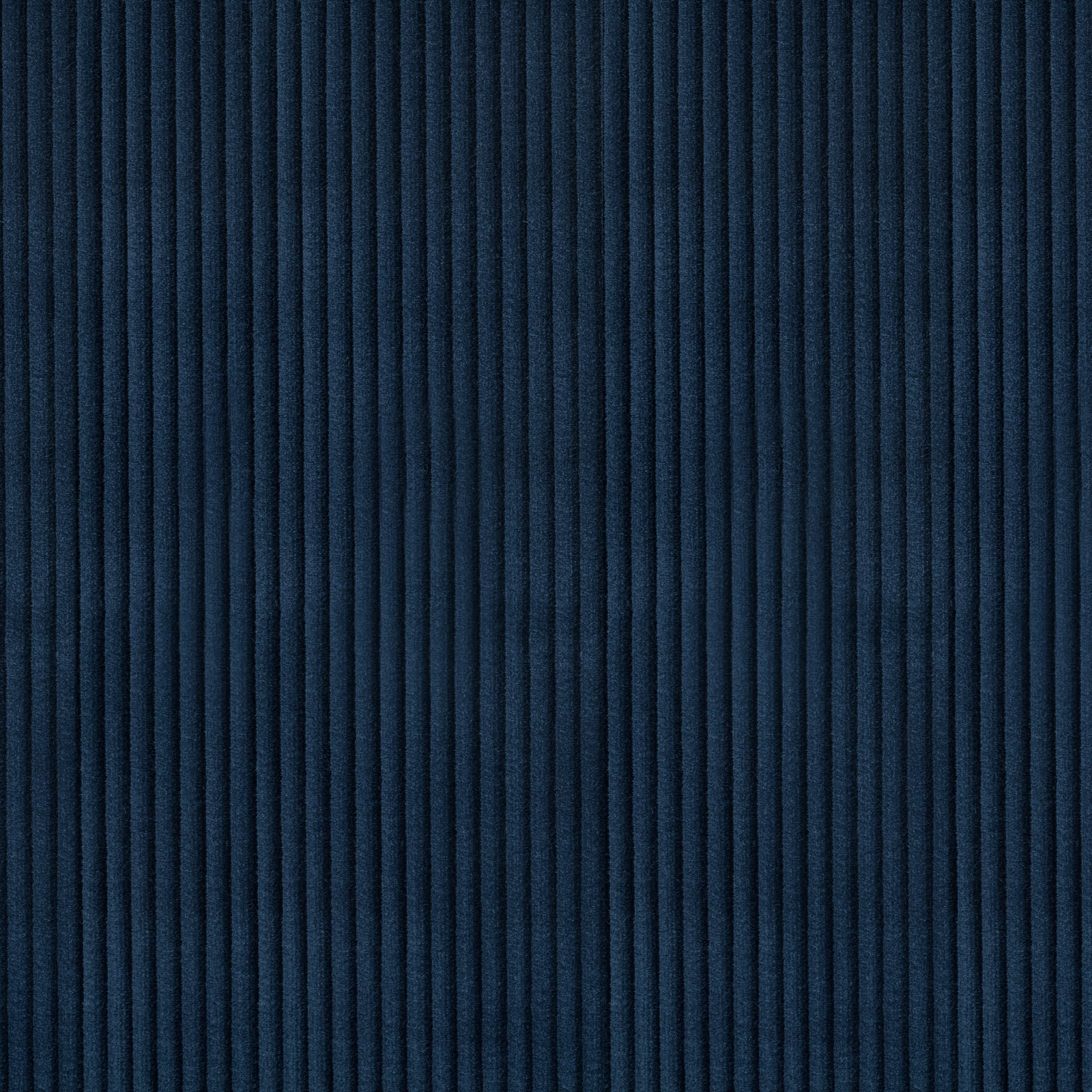 Deep ink-navy fabric with closely spaced vertical ribs and a softly shifting surface