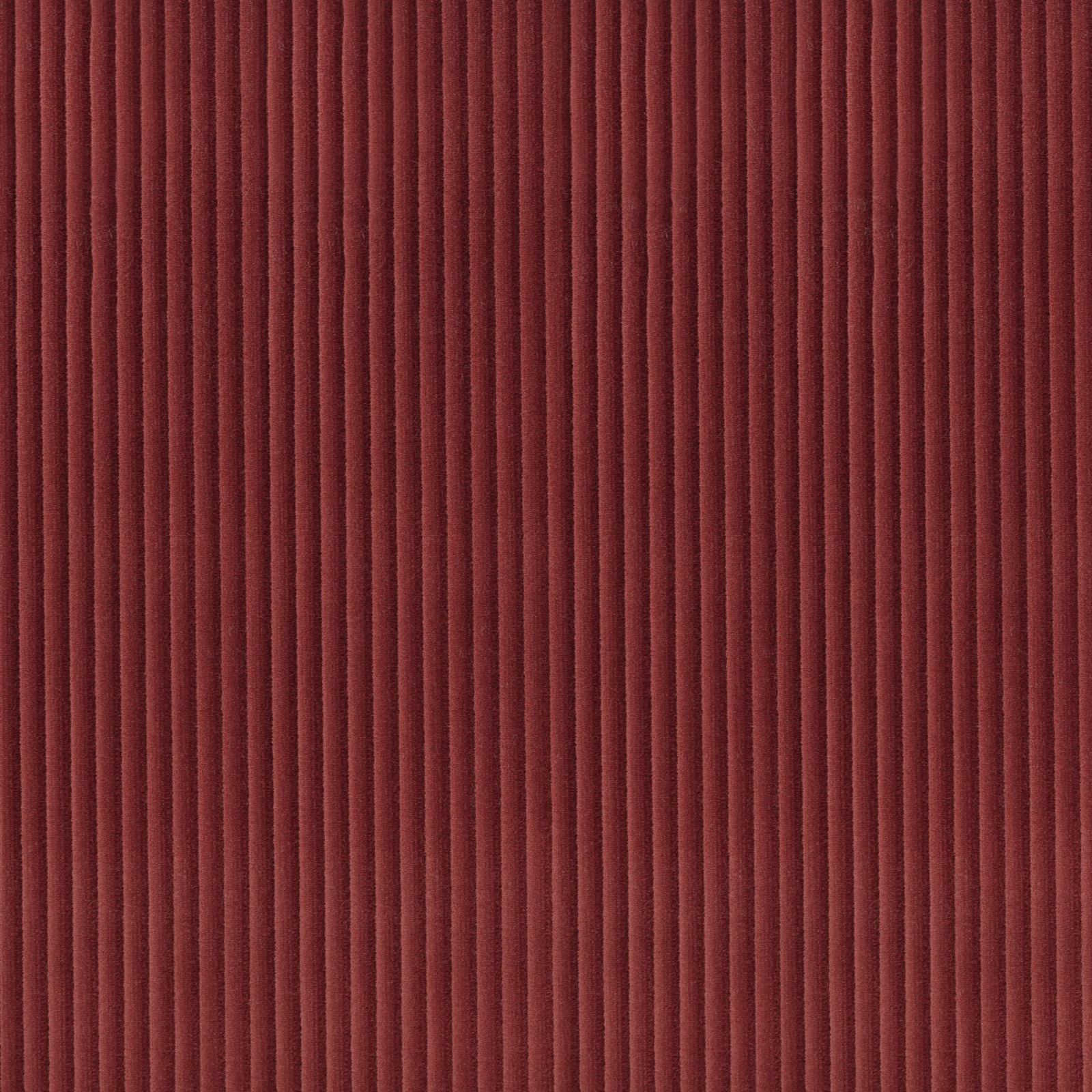 Deep ruby red fabric with closely spaced vertical ribs and shadowed channels