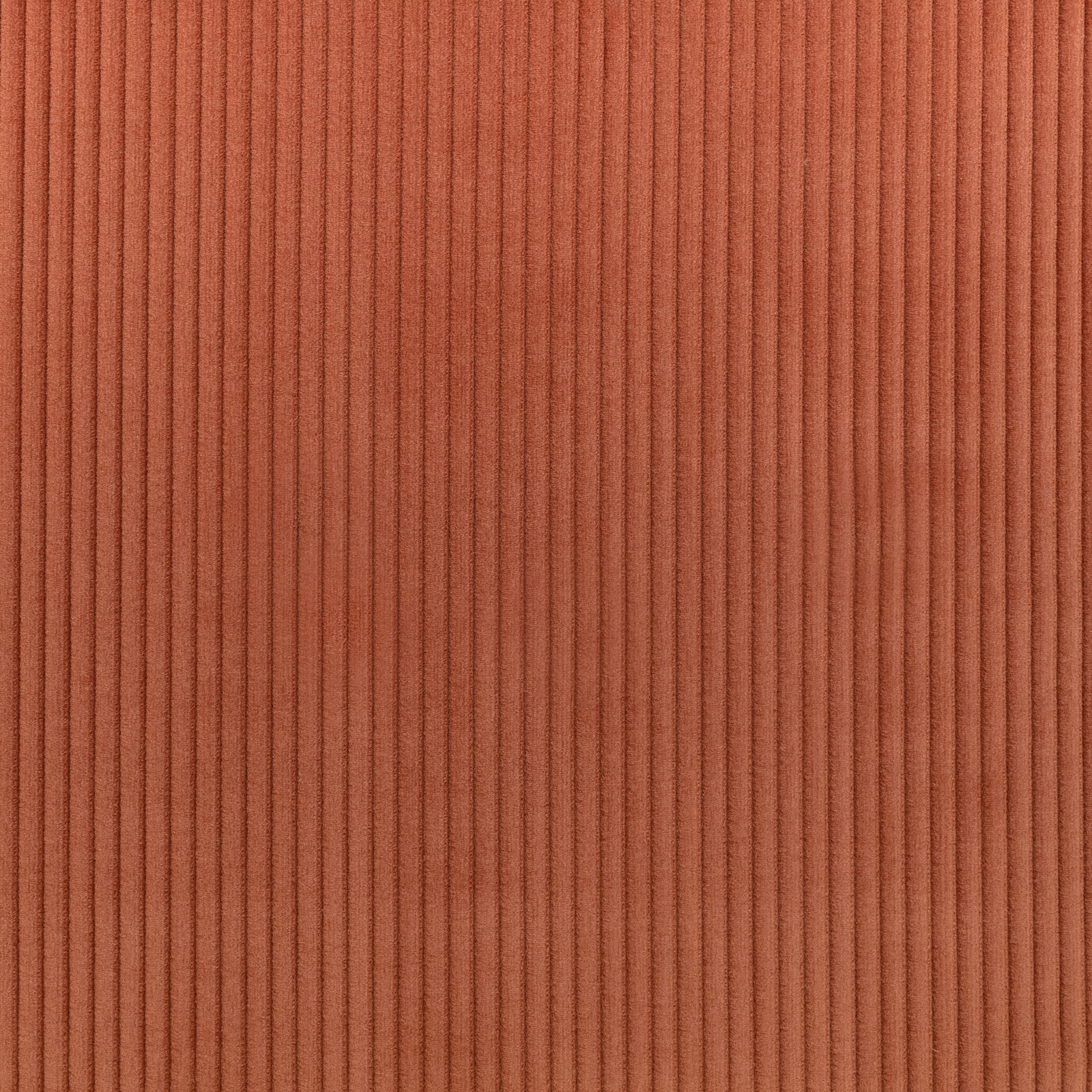 Warm terracotta upholstery textile with fine vertical ribs and shaded channels