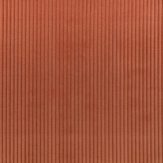 Warm terracotta upholstery textile with fine vertical ribs and shaded channels