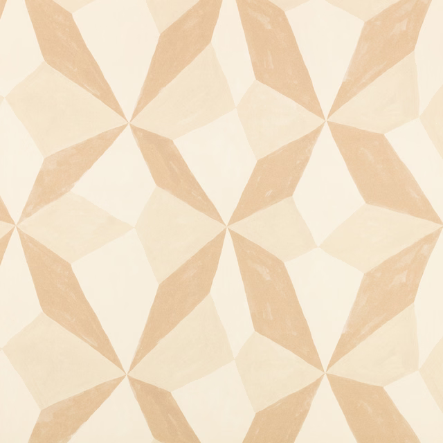 Warm cream fabric with pale tan geometric stars and softly varied surface texture