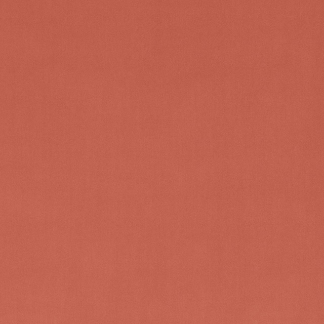 Warm apricot terracotta textile with a smooth, subtly grainy surface