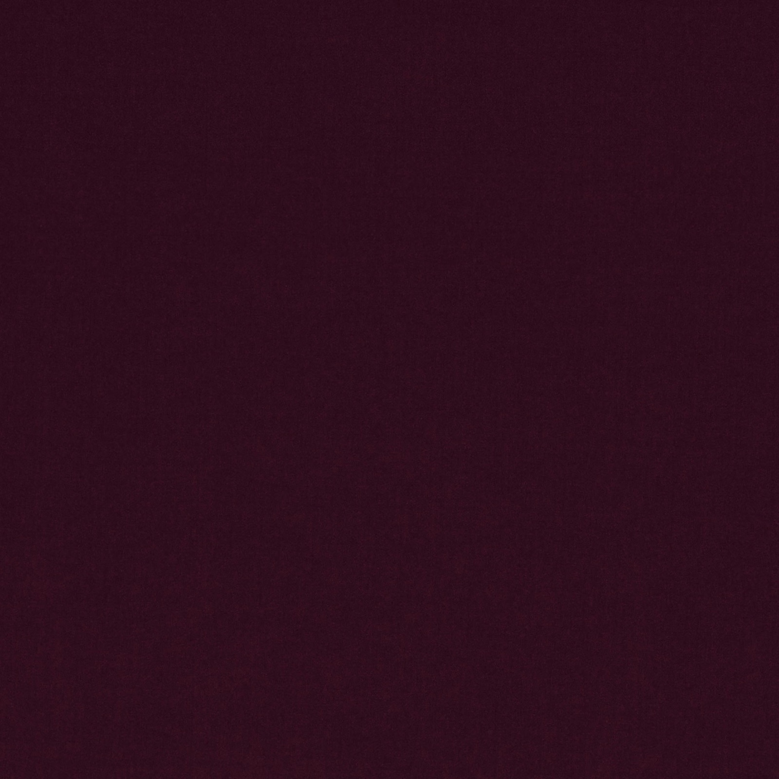 Deep aubergine textile with a faintly brushed, light-absorbing surface