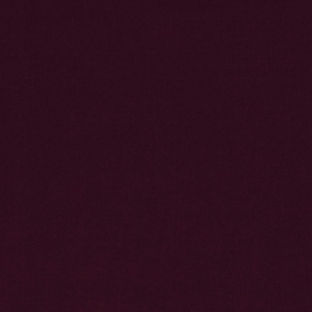 Deep aubergine textile with a faintly brushed, light-absorbing surface