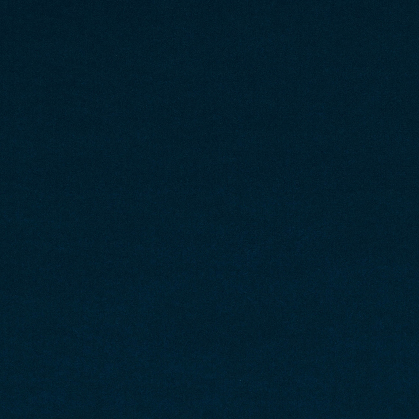 Deep marine-blue textile with a barely mottled, shadowed smooth surface