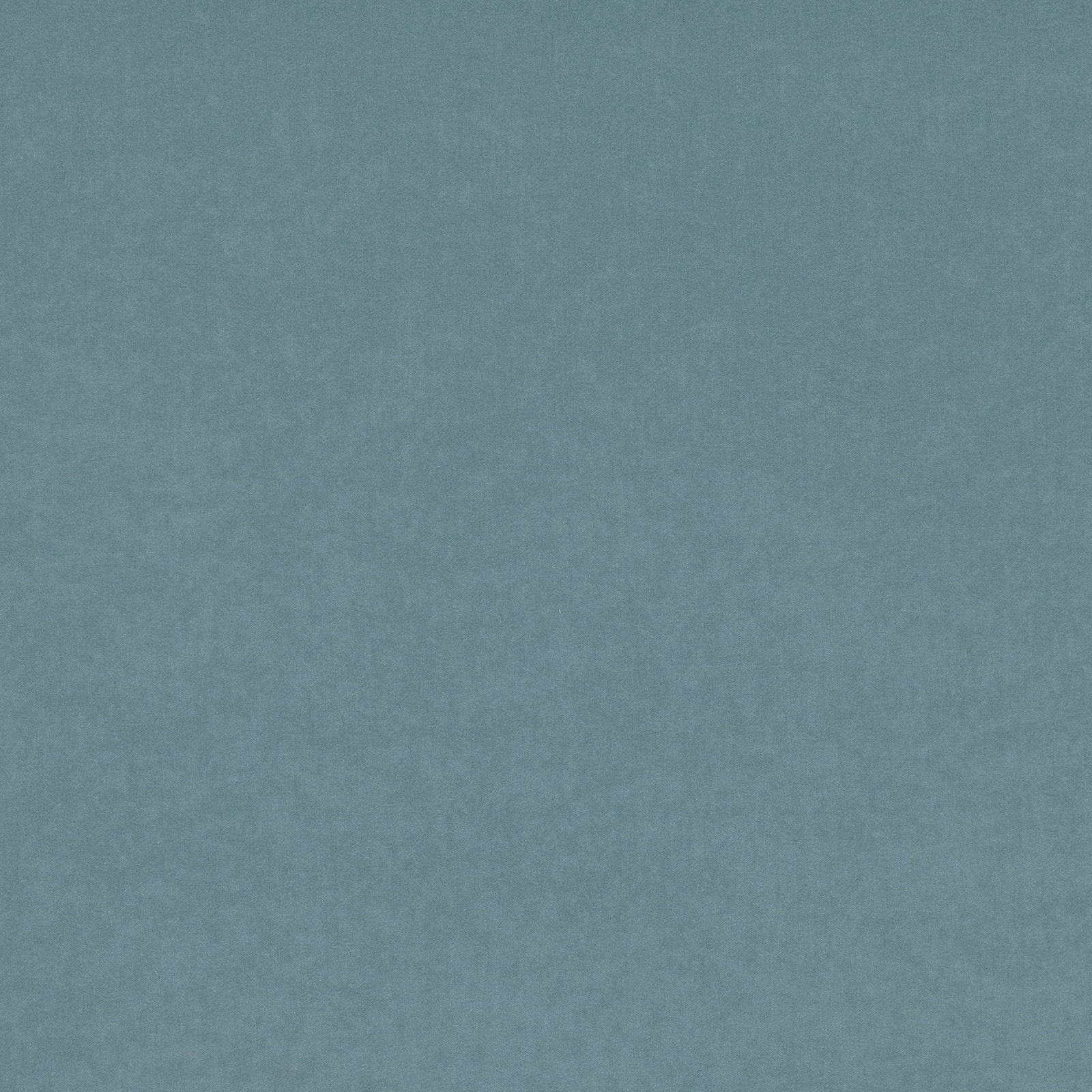 Close-up of muted blue-teal fabric with a fine, softly mottled plain texture