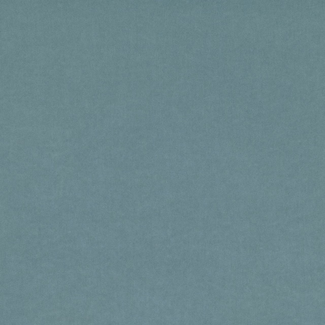 Close-up of muted blue-teal fabric with a fine, softly mottled plain texture