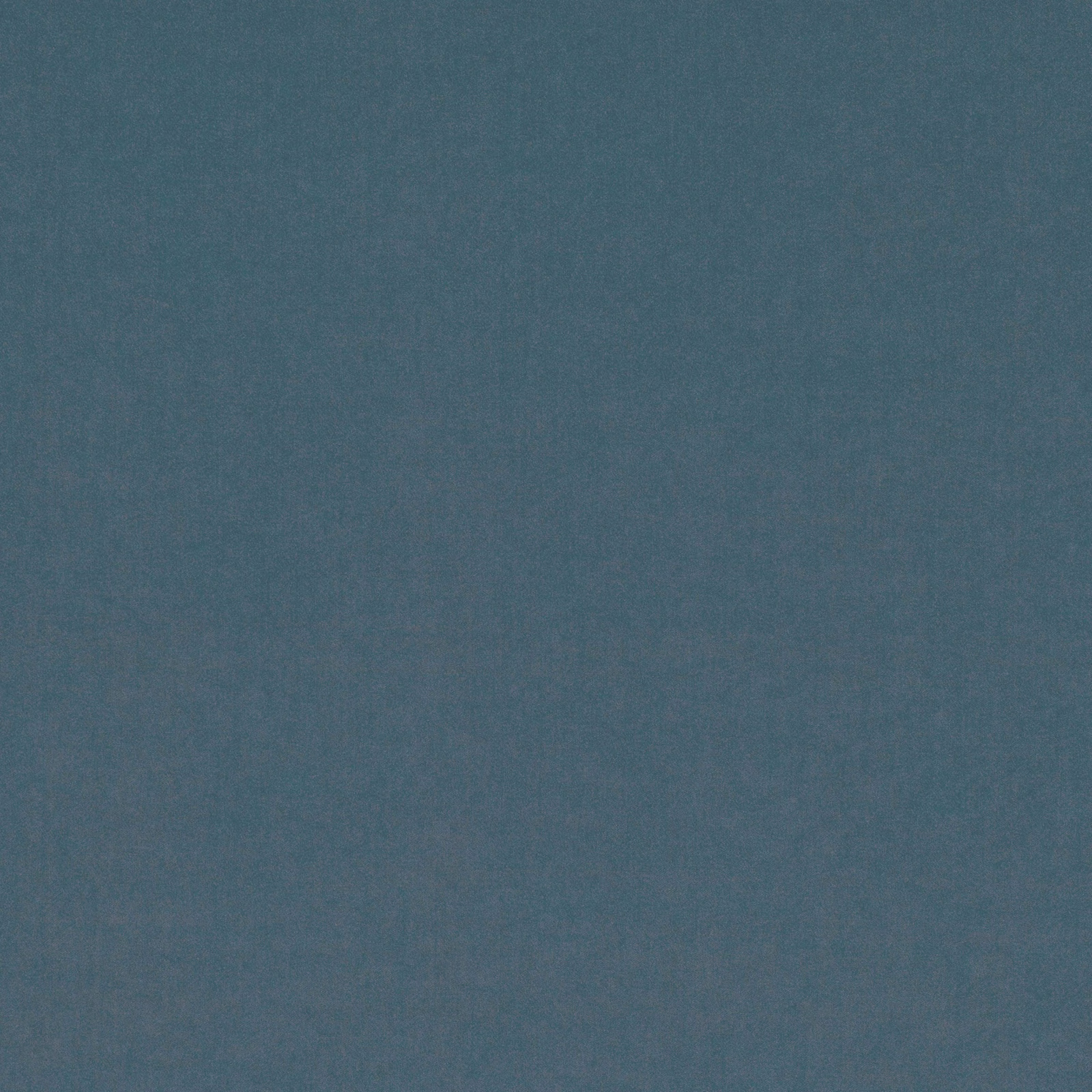 Close-up of muted blue-teal fabric with a softly mottled, low-contrast texture