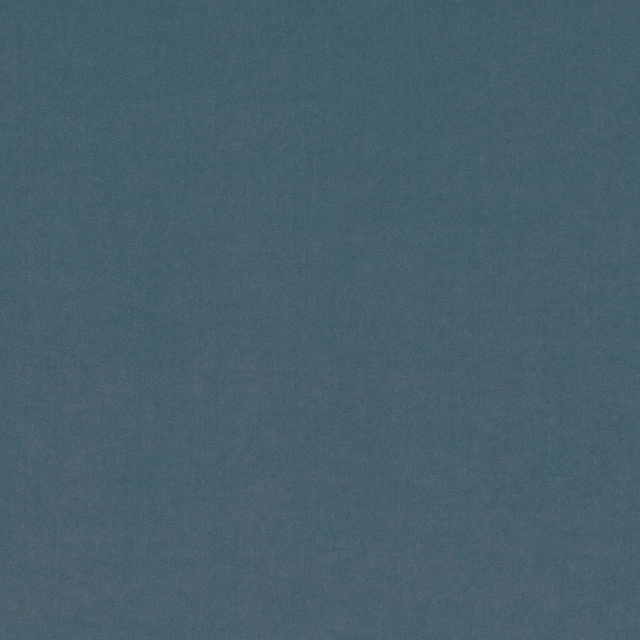 Close-up of muted blue-teal fabric with a softly mottled, low-contrast texture