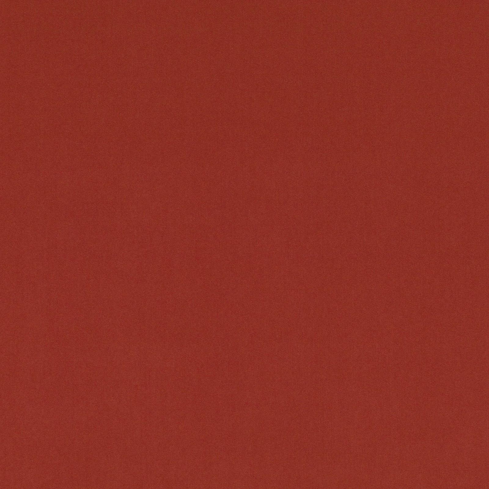 Warm paprika-red plain fabric with subtle tonal mottling and a soft matte surface