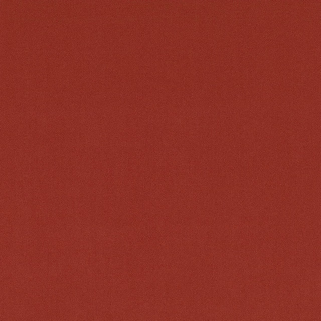 Warm paprika-red plain fabric with subtle tonal mottling and a soft matte surface