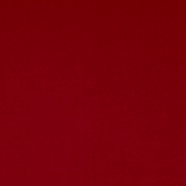 Deep sangria-red smooth cloth with faint tonal texture across the swatch