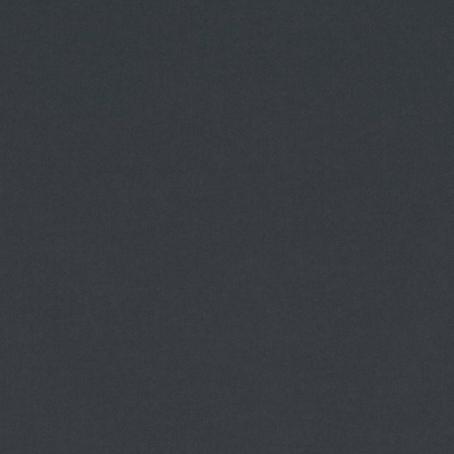 Deep charcoal grey plain textile with a softly mottled, low-sheen surface