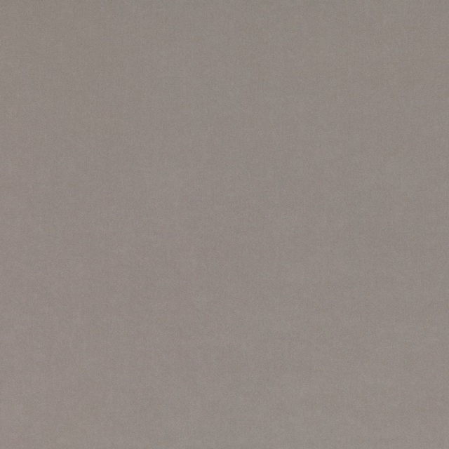 Close-up of smooth silver-grey fabric with an even, softly textured surface