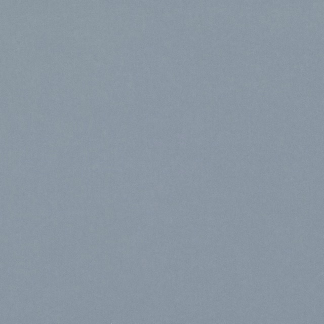 Close-up of smooth smoke-blue fabric with a subtle, even woven texture