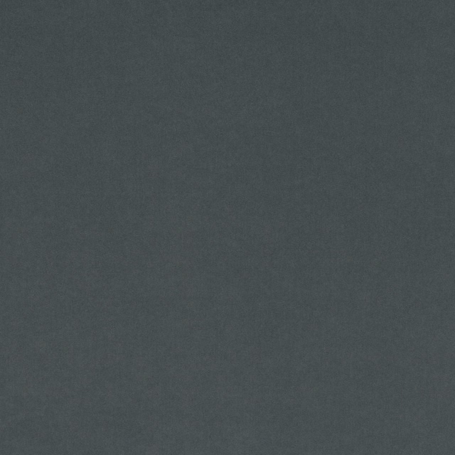 Close-up of deep storm-grey fabric with a softly mottled, smooth surface