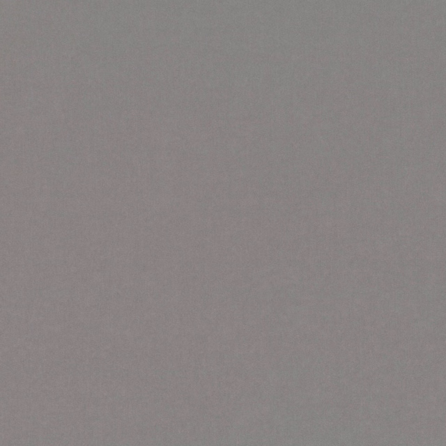 Close view of cool mid-grey plain weave with a softly smooth surface