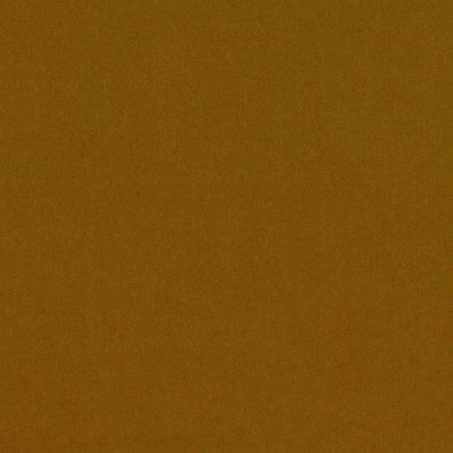 Warm tobacco-brown plain textile with a smooth, softly shaded surface