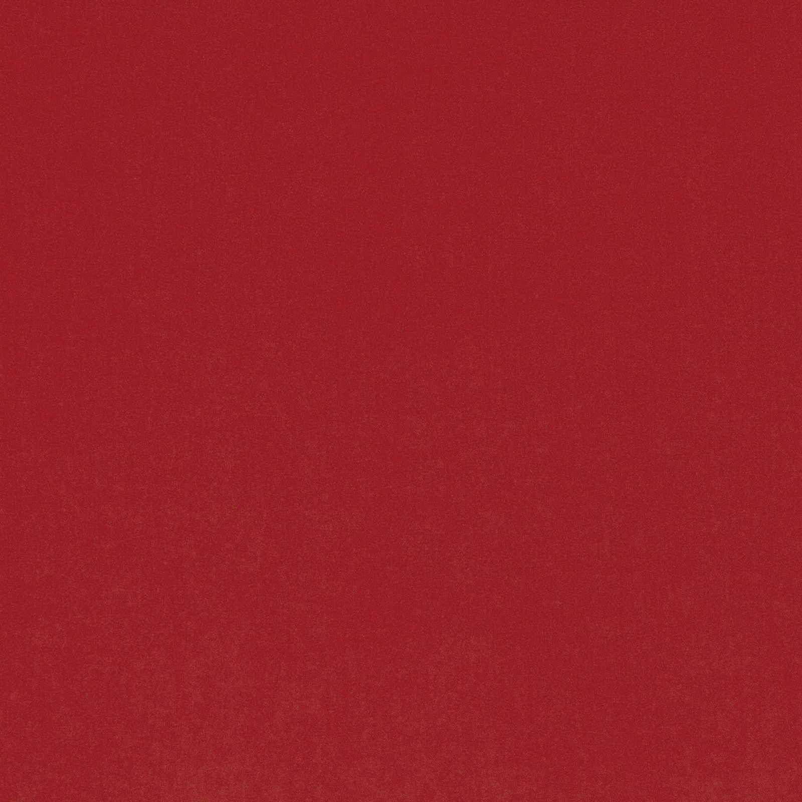 Close-up of Smooth Tomato fabric in rich, subtly textured tomato red