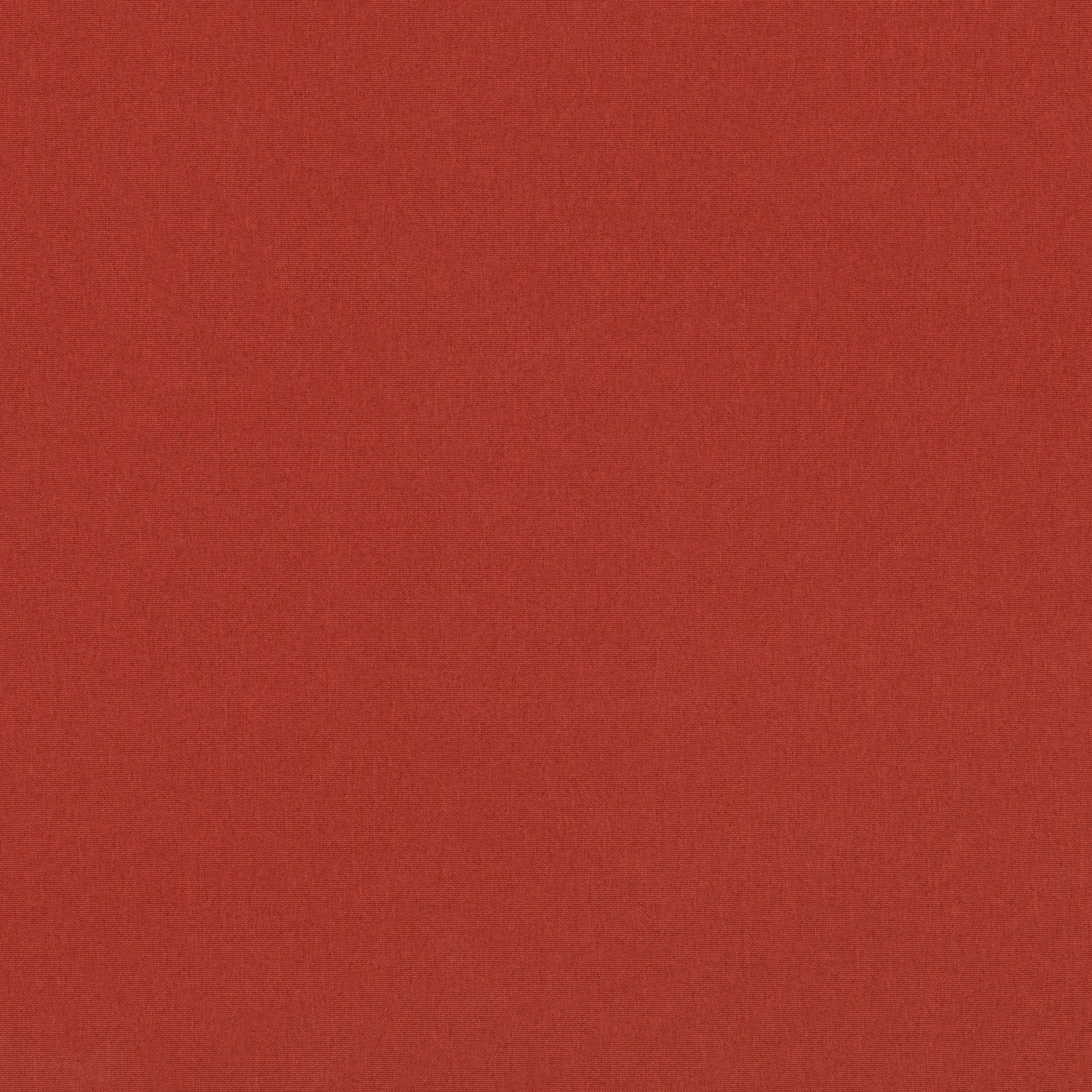 Close-up of warm chilli-red fabric with a fine, subtly striated woven texture