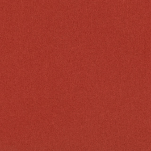 Close-up of warm chilli-red fabric with a fine, subtly striated woven texture