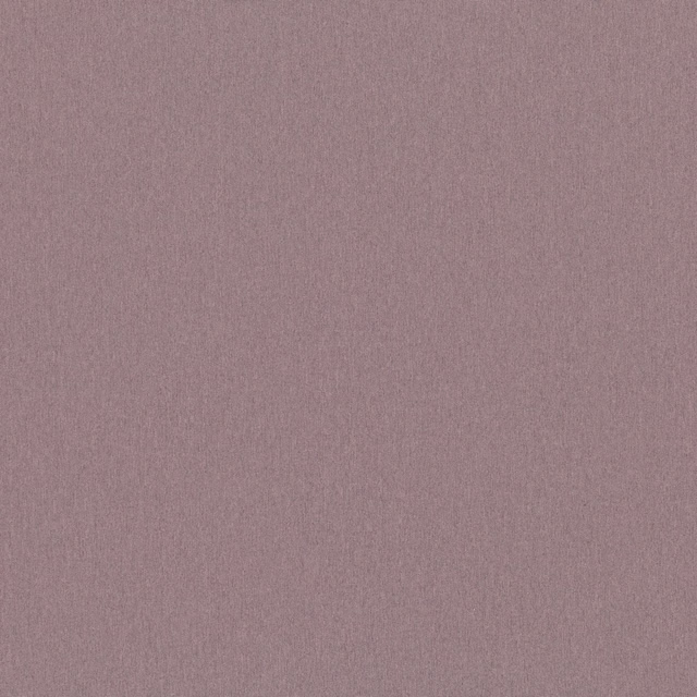 Dusty mauve plain fabric with a fine, softly flecked woven texture