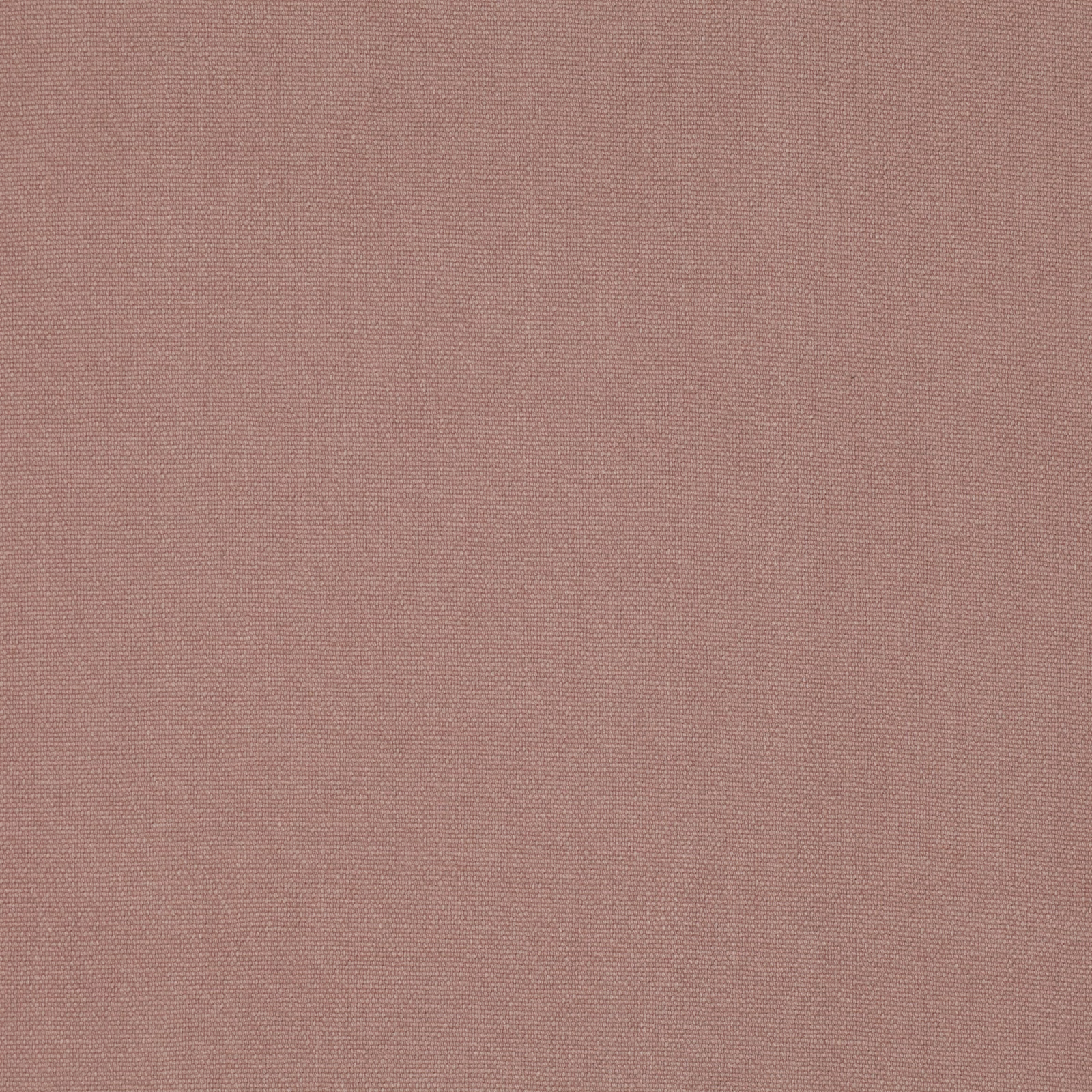 Close-up of dusty blush-pink fabric showing a fine, even woven texture