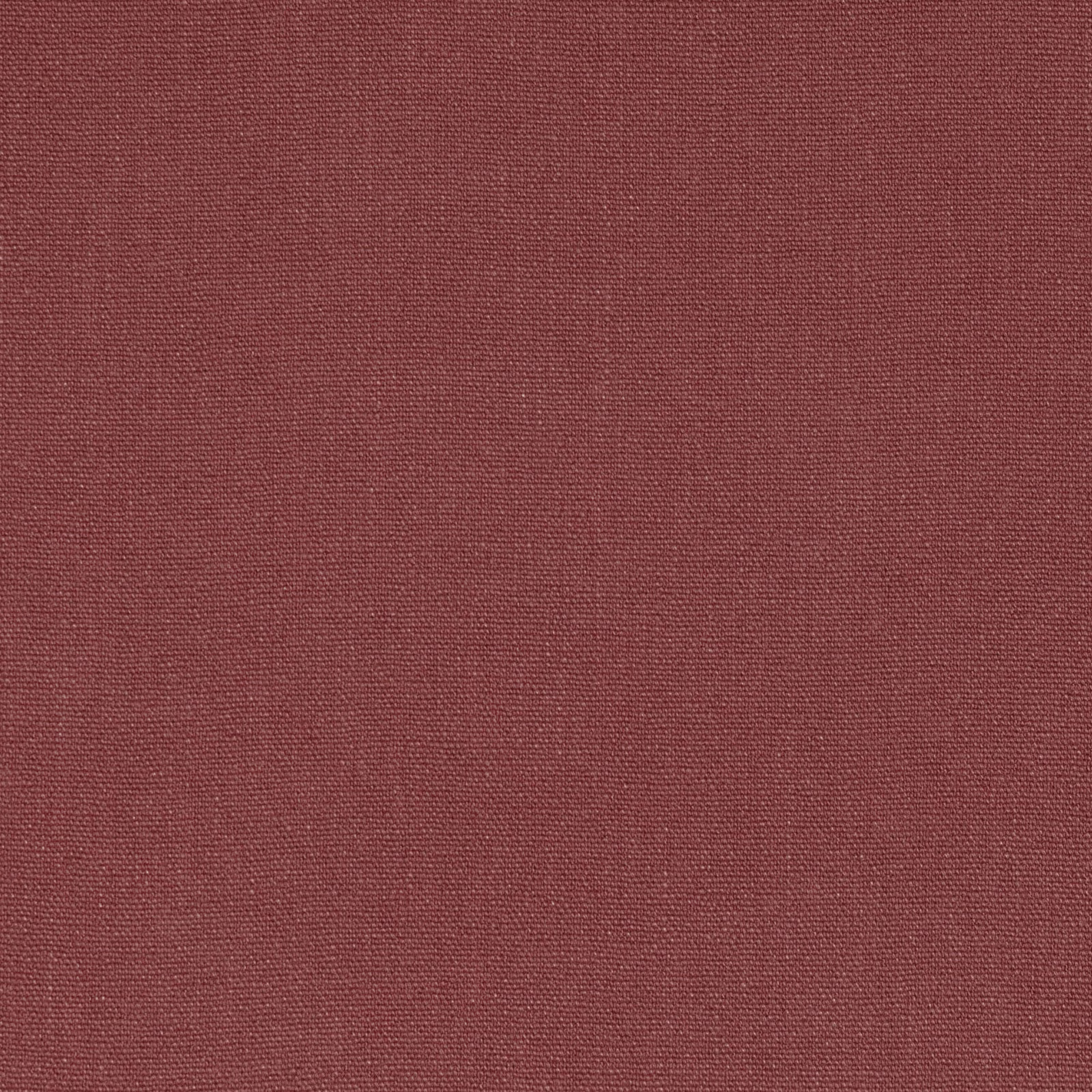 Close-up of muted brick-red Soho fabric with a fine, tightly woven texture