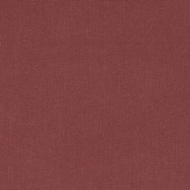 Close-up of muted brick-red Soho fabric with a fine, tightly woven texture