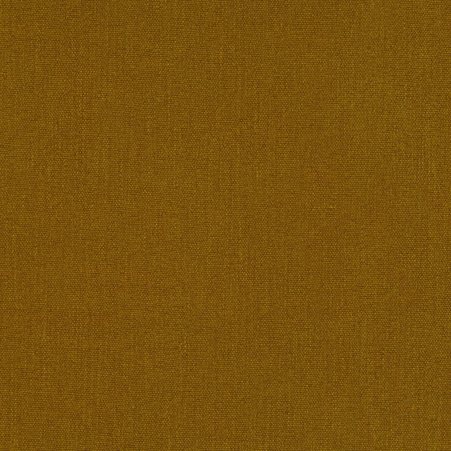 Close view of warm harvest-gold fabric with a fine, subtly textured plain weave