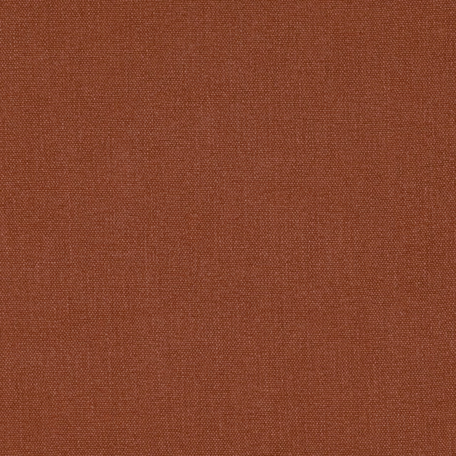Close-up of muted terracotta plain weave with fine crosswise texture