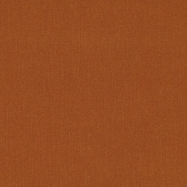 Close-up of rust terracotta fabric with a fine, tightly woven tonal texture