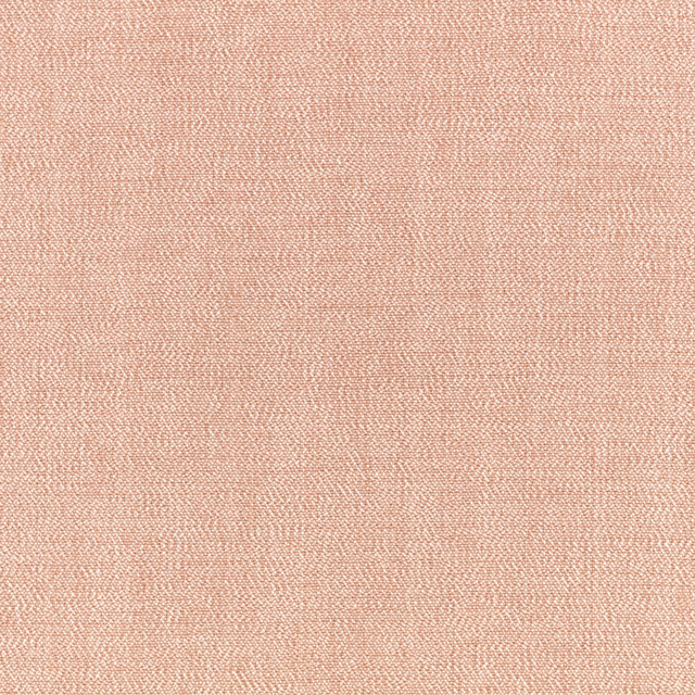 Close-up of muted dusty pink fabric with a fine, irregular woven texture