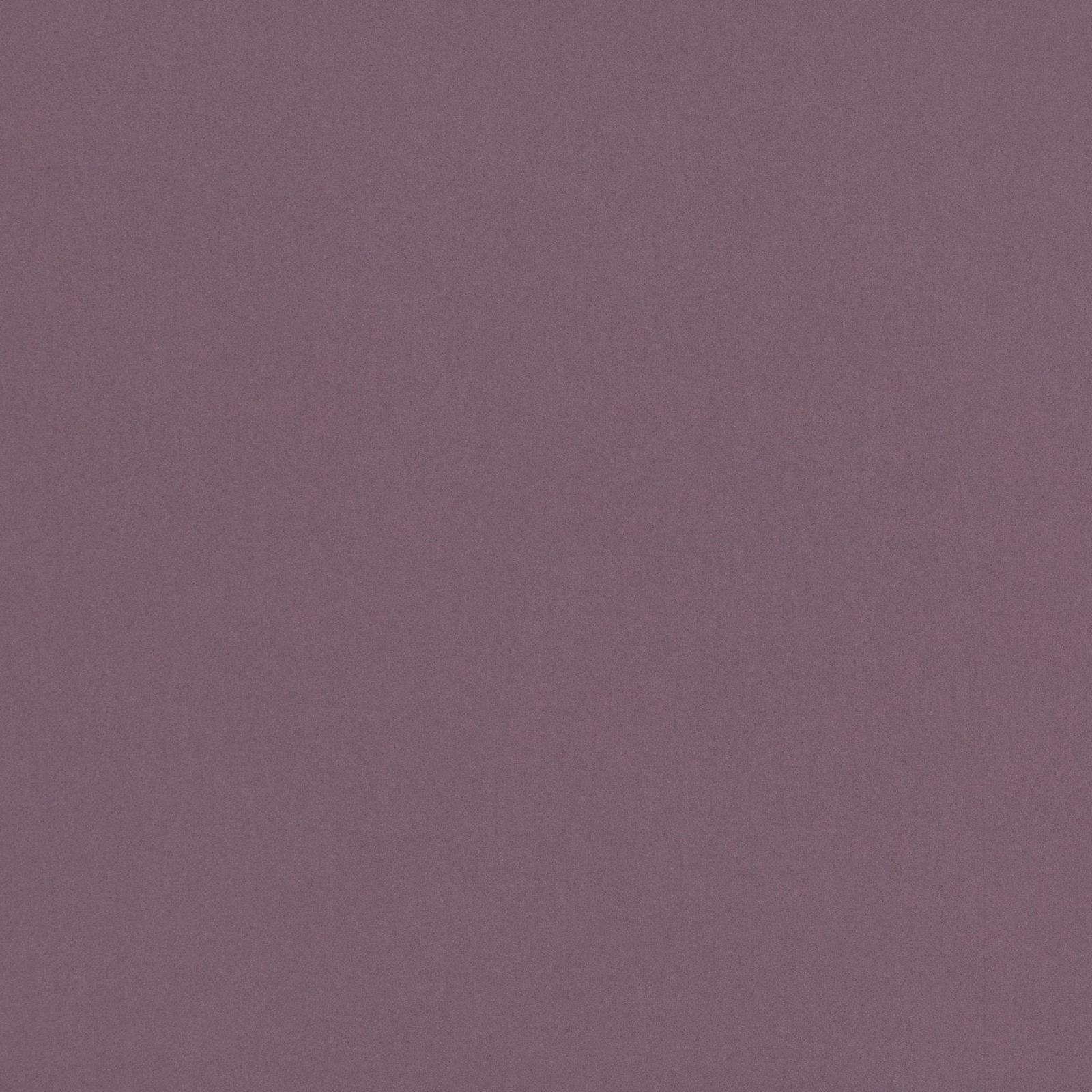 Muted dewberry mauve fabric with a fine, softly mottled plain surface