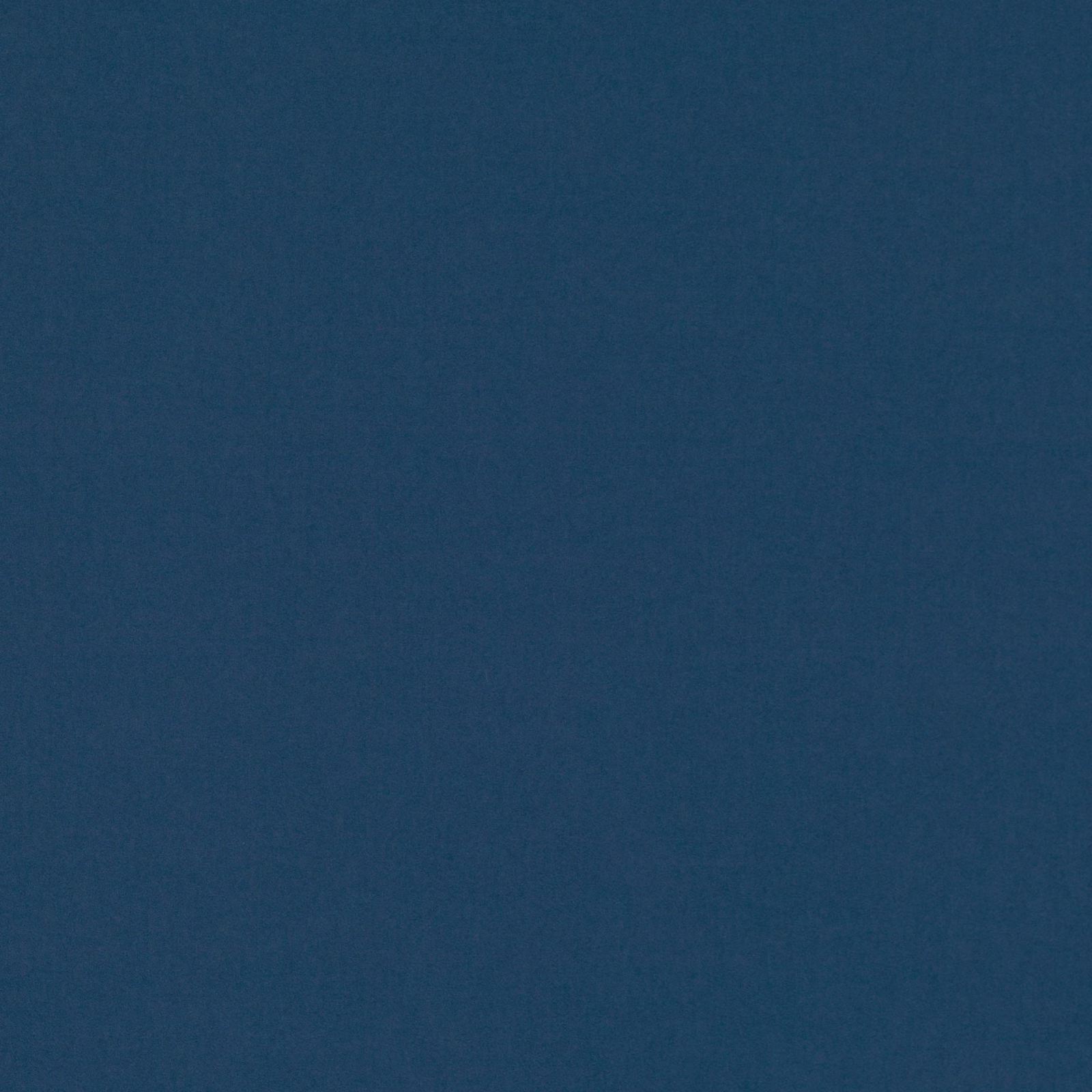 Deep indigo-blue plain weave with subtle tonal texture in close-up