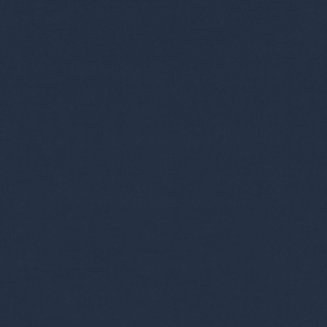 Close-up of finely textured deep ink navy plain fabric in Tone Marine