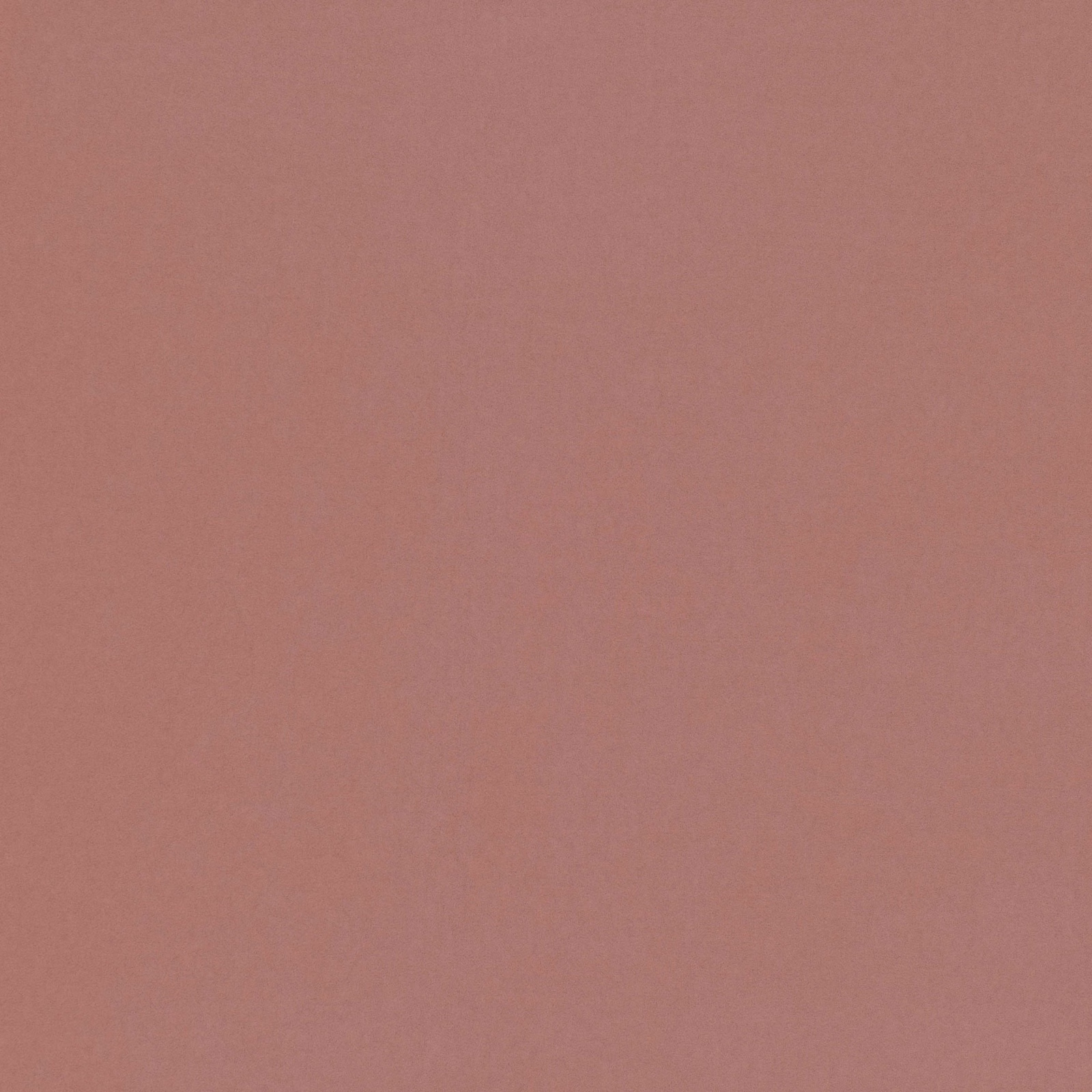 Dusty vintage rose plain fabric with a soft, fine surface texture
