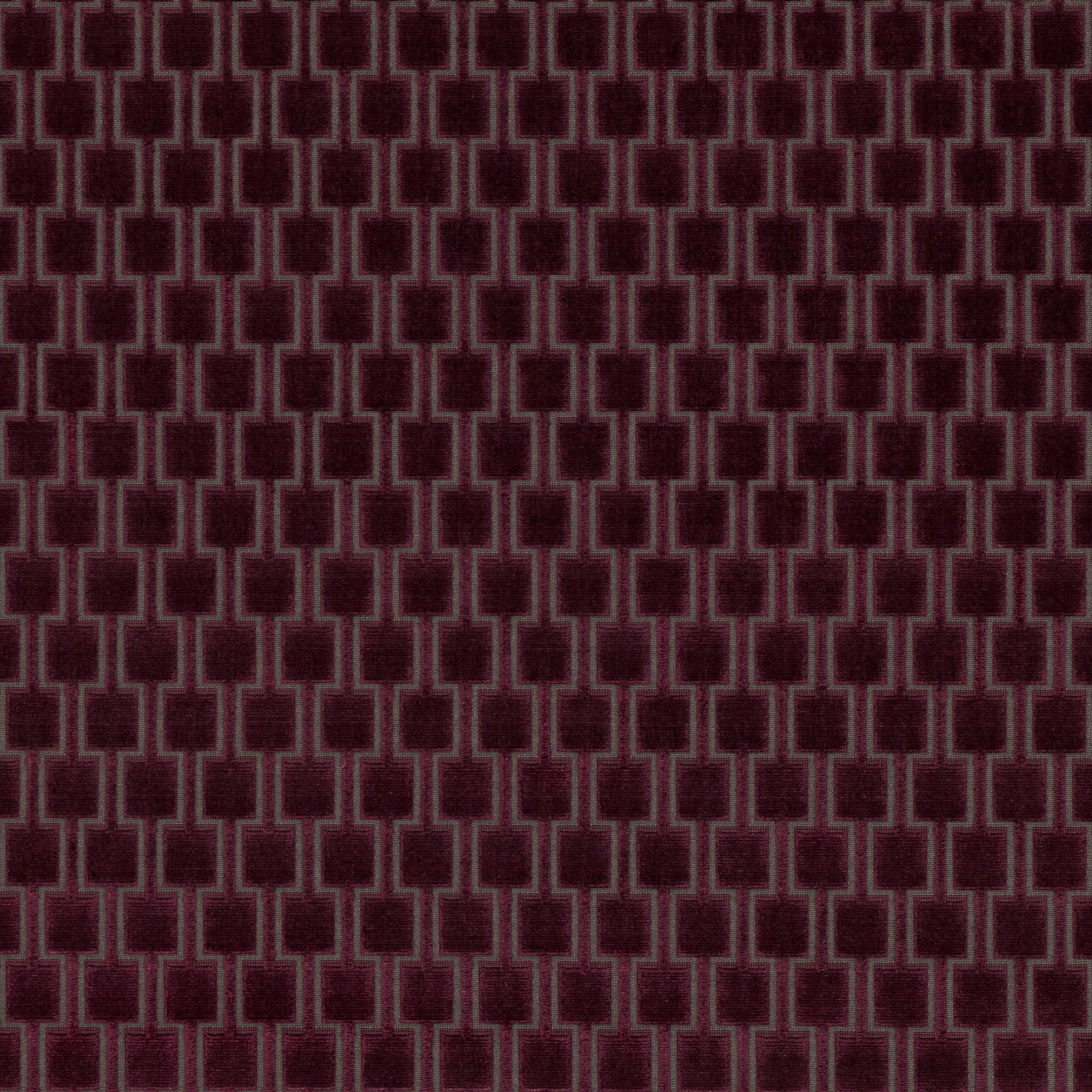 Deep blackcurrant woven fabric with muted stepped rectangular lattice in close repeat.