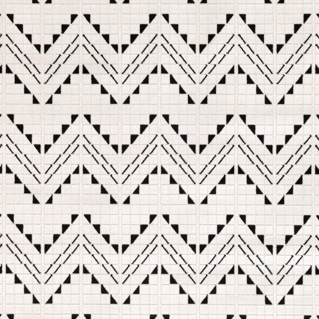 Black and ivory woven textile with repeating chevrons and fine square grid texture