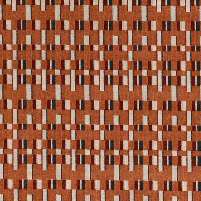 Burnt orange woven textile with cream, burgundy and charcoal broken-block motif