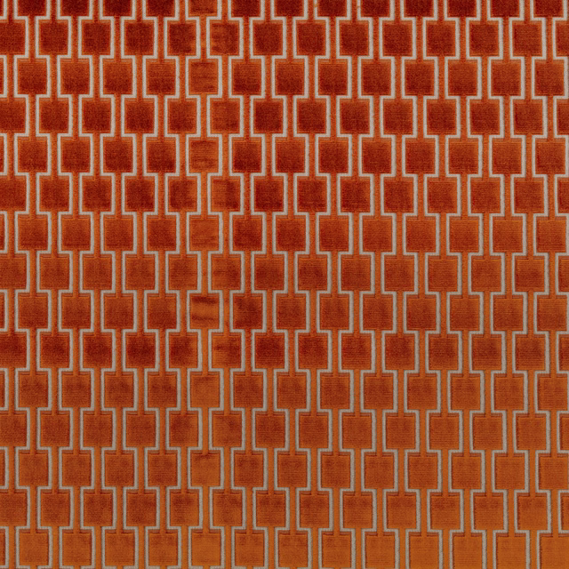 Rust-cinnamon geometric fabric with pale linked lines and a softly textured surface