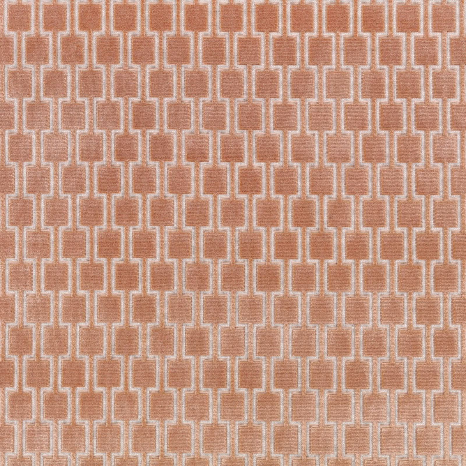 Warm dusty pink fabric with pale cream interlocking rectangular geometric lines and fine woven texture