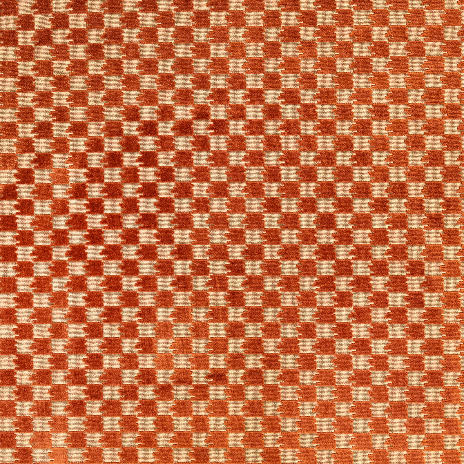 Cinnamon rust and cream woven geometric checker fabric with a tactile textured surface
