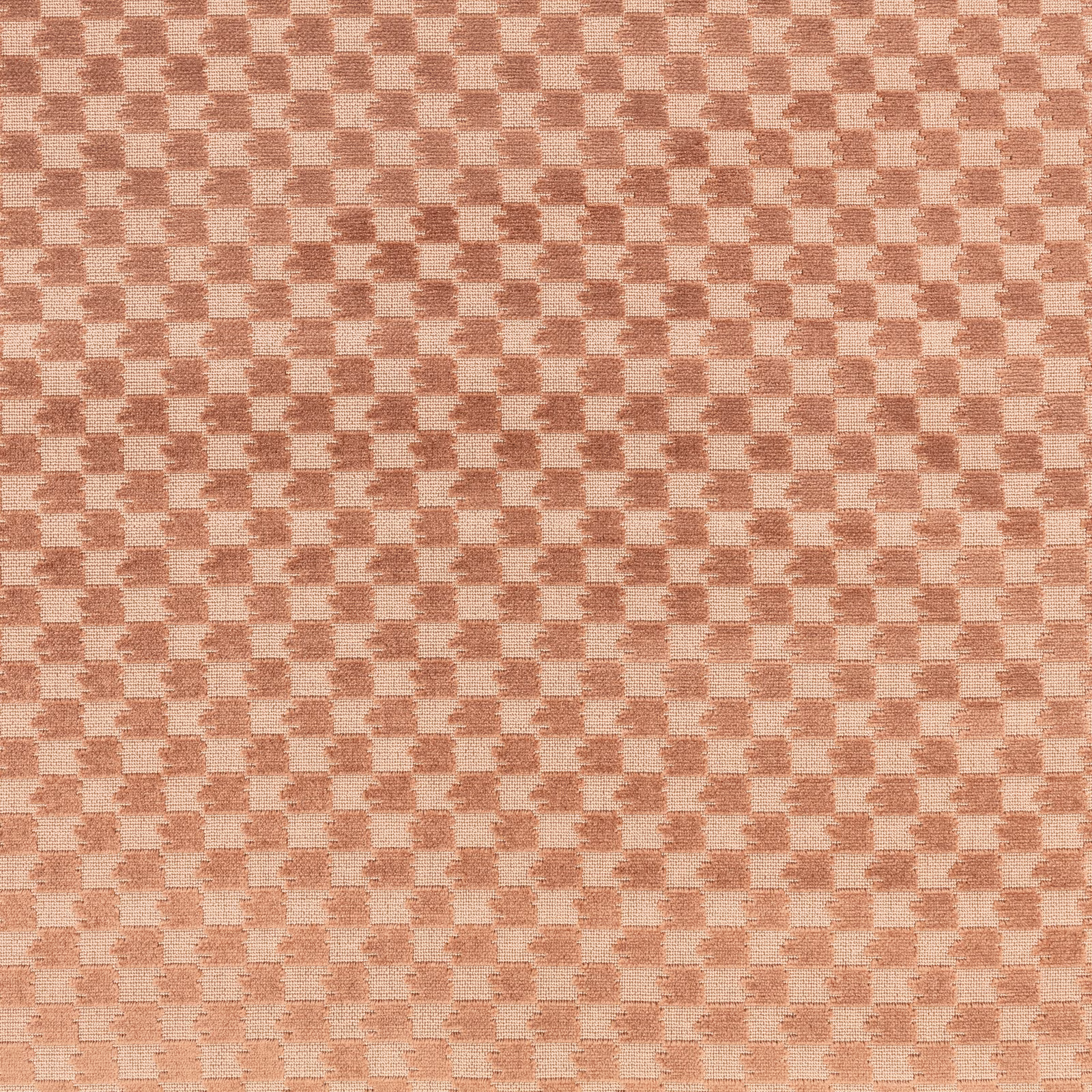 Dusty pink woven fabric with a small irregular terracotta broken-check pattern
