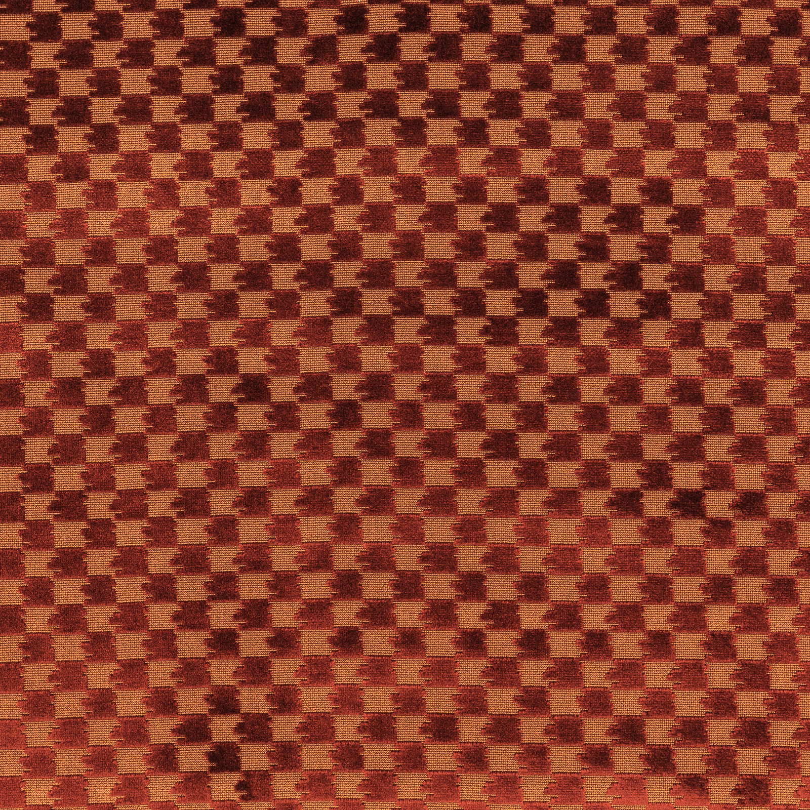 Rust terracotta and burgundy woven textile with a small irregular checker pattern
